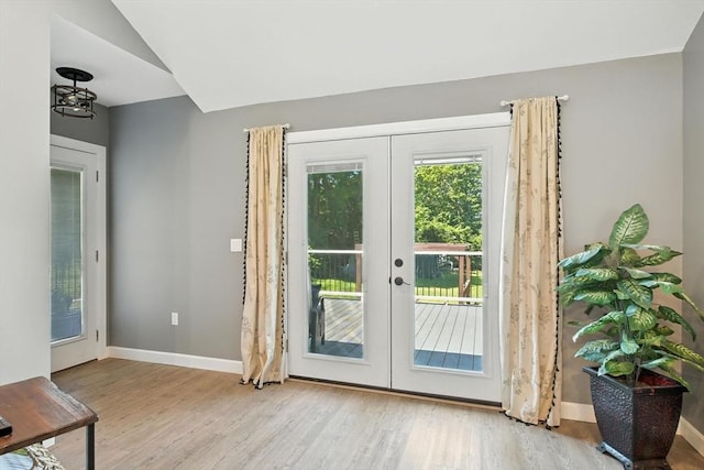 683 Rogers Ave, West Springfield, MA 01089 - doorway featuring french doors, wood finished floors, and lofted ceiling