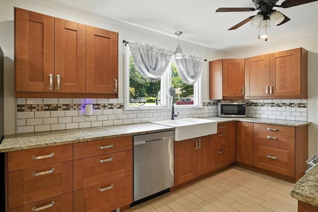 683 Rogers Ave, West Springfield, MA 01089 - kitchen featuring stainless steel appliances, decorative backsplash, brown cabinets, a ceiling fan, and ornamental molding
