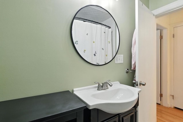 683 Rogers Ave, West Springfield, MA 01089 - full bath with wood finished floors and vanity