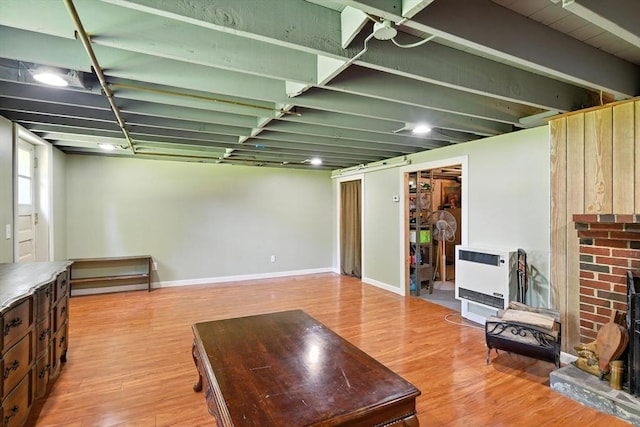 683 Rogers Ave, West Springfield, MA 01089 - living area with heating unit and wood finished floors
