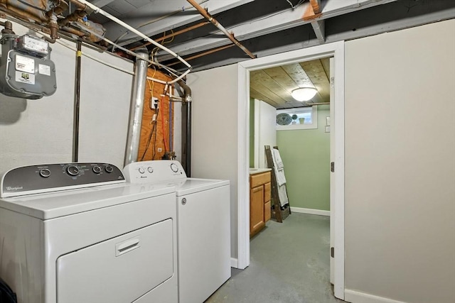683 Rogers Ave, West Springfield, MA 01089 - laundry area with independent washer and dryer and baseboards