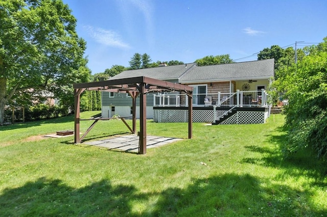 683 Rogers Ave, West Springfield, MA 01089 - rear view of property featuring a ceiling fan, a yard, and a wooden deck