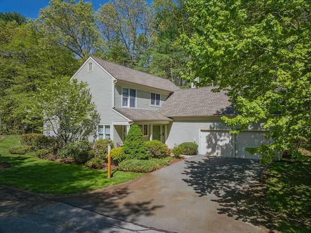 7 Alder Way Unit 7, Bedford, MA 01730 - view of front of home featuring asphalt driveway, an attached garage, a front lawn, and a shingled roof
