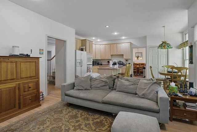 7 Alder Way Unit 7, Bedford, MA 01730 - living area featuring light wood-type flooring, recessed lighting, and stairway