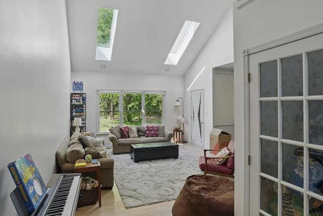 7 Alder Way Unit 7, Bedford, MA 01730 - living room with a skylight, high vaulted ceiling, and wood finished floors