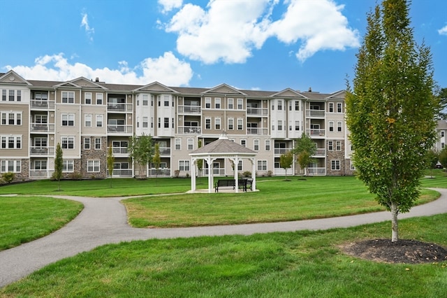 view of home's community featuring a gazebo and a yard