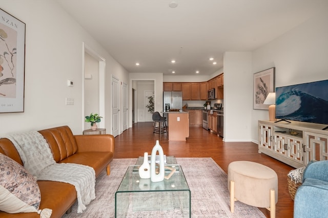 living room featuring dark hardwood / wood-style flooring