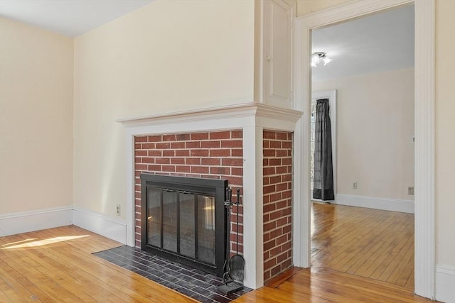 301 S Main, Haverhill, MA 01835 - interior details featuring baseboards, a fireplace, and wood finished floors