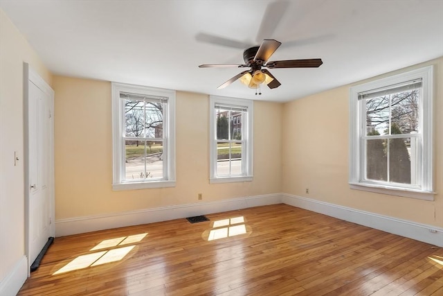 301 S Main, Haverhill, MA 01835 - empty room featuring baseboards, a ceiling fan, and hardwood / wood-style flooring