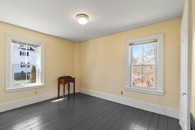 301 S Main, Haverhill, MA 01835 - unfurnished room with baseboards and dark wood-style floors