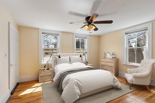 301 S Main, Haverhill, MA 01835 - bedroom with a ceiling fan, baseboards, and light wood finished floors