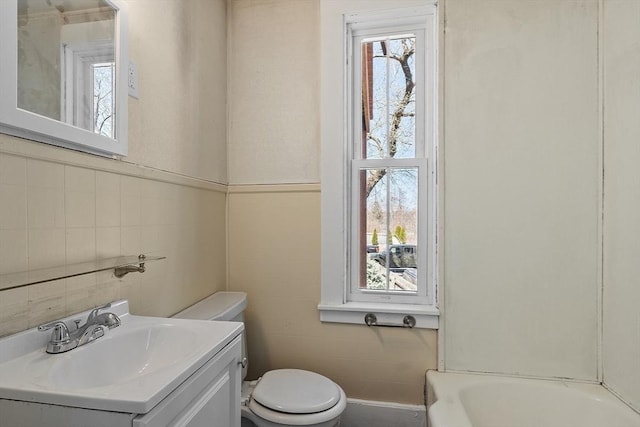 301 S Main, Haverhill, MA 01835 - full bathroom with a bathing tub, vanity, toilet, and tile walls