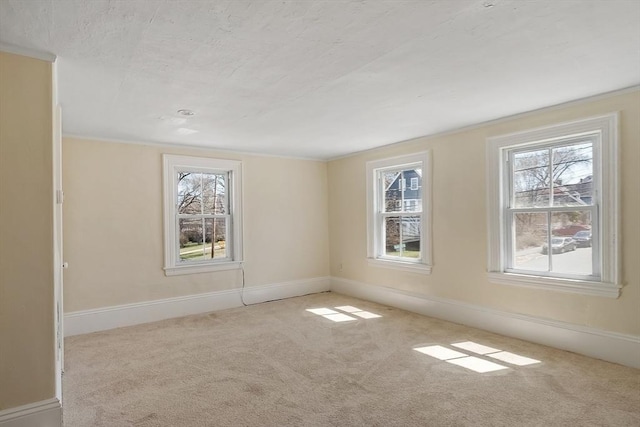 301 S Main, Haverhill, MA 01835 - spare room featuring carpet floors, baseboards, and a wealth of natural light