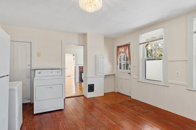 301 S Main, Haverhill, MA 01835 - interior space with laundry area, a notable chandelier, washer and clothes dryer, and hardwood / wood-style flooring