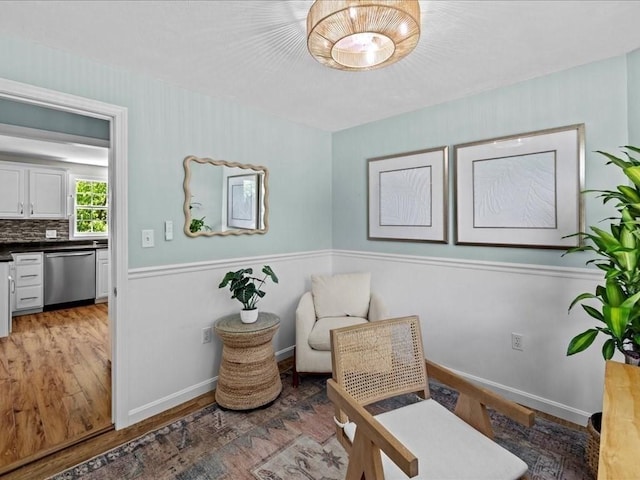 1137 Ferry St, Marshfield, MA 02050 - sitting room with light wood-type flooring, wainscoting, and baseboards