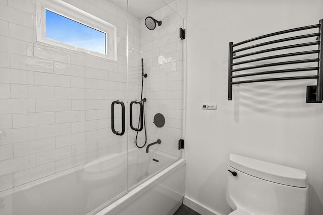 1137 Ferry St, Marshfield, MA 02050 - full bath featuring toilet, bath / shower combo with glass door, baseboards, and a towel warmer