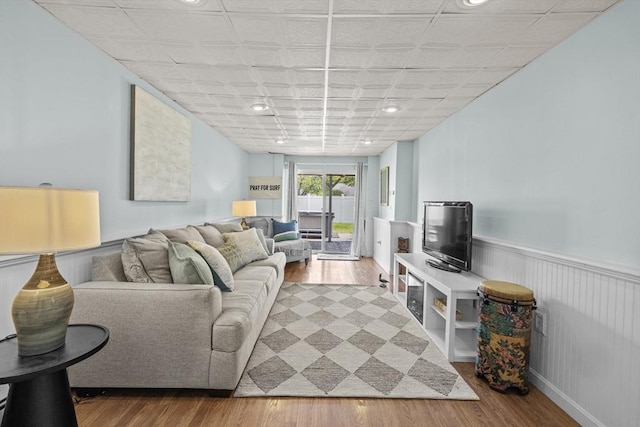 1137 Ferry St, Marshfield, MA 02050 - living room featuring wood finished floors, a wainscoted wall, and recessed lighting