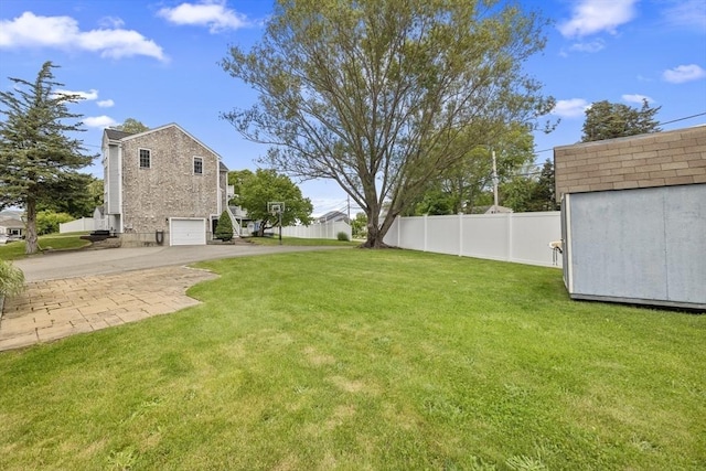 1137 Ferry St, Marshfield, MA 02050 - view of yard with concrete driveway and an attached garage