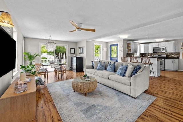 1137 Ferry St, Marshfield, MA 02050 - living room featuring light wood-type flooring and ceiling fan