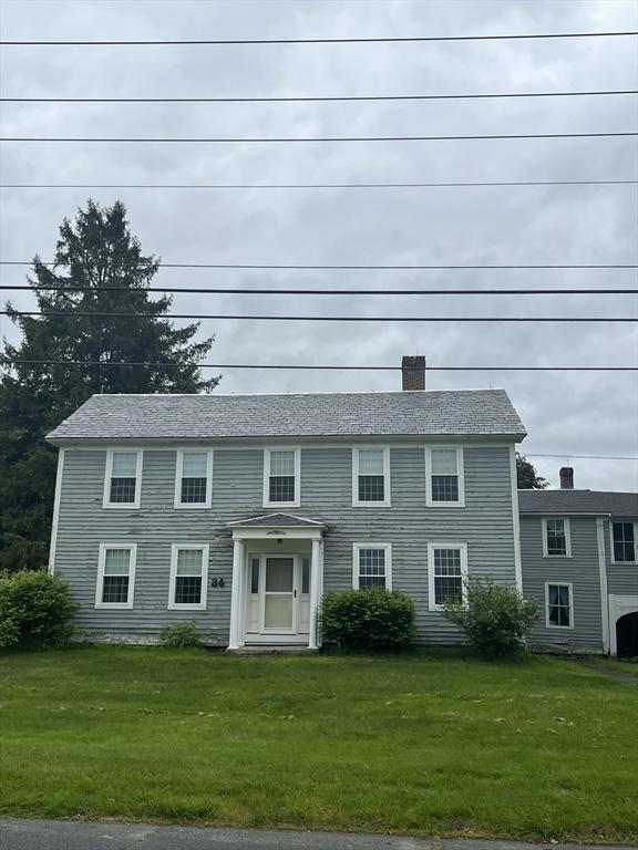 34 Old Bernardston Rd, Northfield, MA 01360 - colonial house featuring a front lawn and a chimney