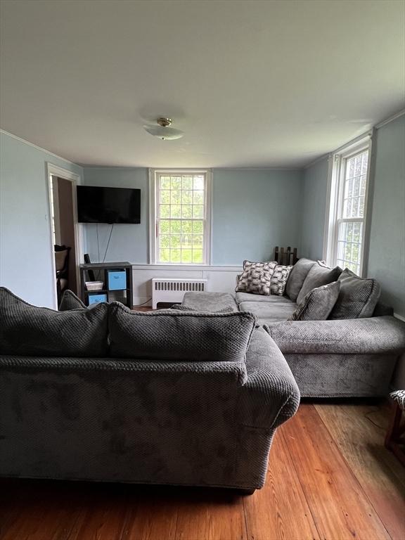 34 Old Bernardston Rd, Northfield, MA 01360 - living area featuring radiator and wood finished floors