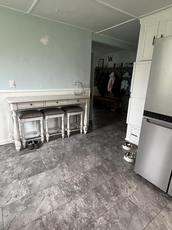 34 Old Bernardston Rd, Northfield, MA 01360 - kitchen with freestanding refrigerator, white cabinetry, and baseboards