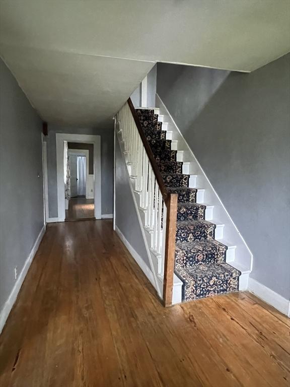 34 Old Bernardston Rd, Northfield, MA 01360 - stairs featuring hardwood / wood-style flooring and baseboards