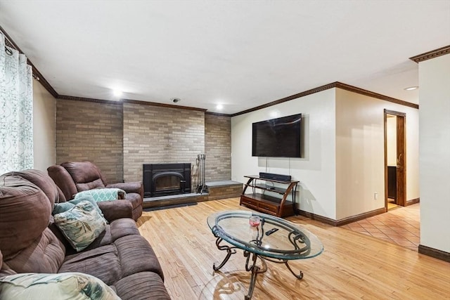2 Orchard St, Berkley, MA 02779 - living room featuring light wood-style floors, crown molding, a fireplace, and baseboards
