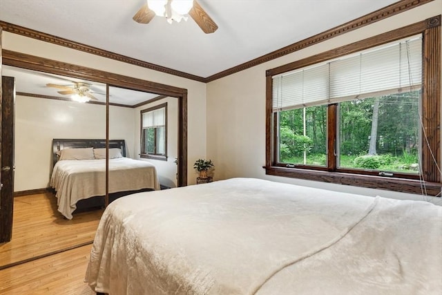 2 Orchard St, Berkley, MA 02779 - bedroom featuring light wood-style flooring, crown molding, baseboards, and a ceiling fan