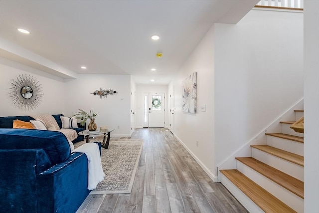 438 Granite St, Worcester, MA 01604 - living room featuring wood finished floors, recessed lighting, and stairway