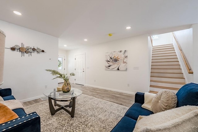 438 Granite St, Worcester, MA 01604 - living area with light wood finished floors, stairway, and recessed lighting