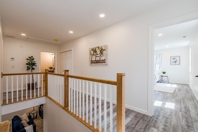 438 Granite St, Worcester, MA 01604 - hallway featuring attic access, wood finished floors, recessed lighting, and an upstairs landing
