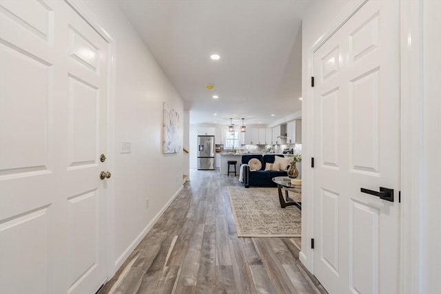 438 Granite St, Worcester, MA 01604 - corridor featuring wood finished floors and recessed lighting