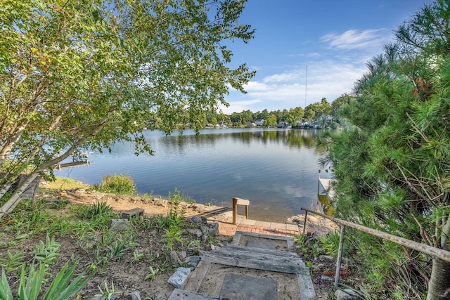 dock area featuring a water view