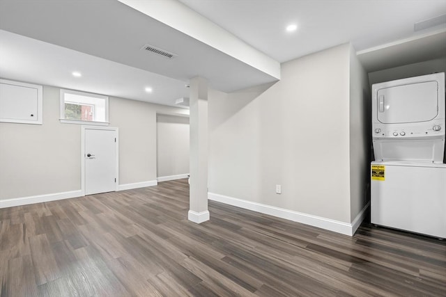 11 Bishop Rd Unit 11, Quincy, MA 02170 - below grade area featuring stacked washer / drying machine, wood finished floors, baseboards, and recessed lighting