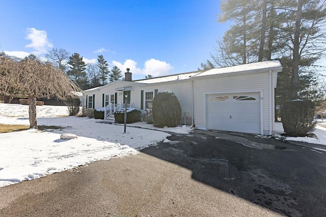 single story home featuring a garage