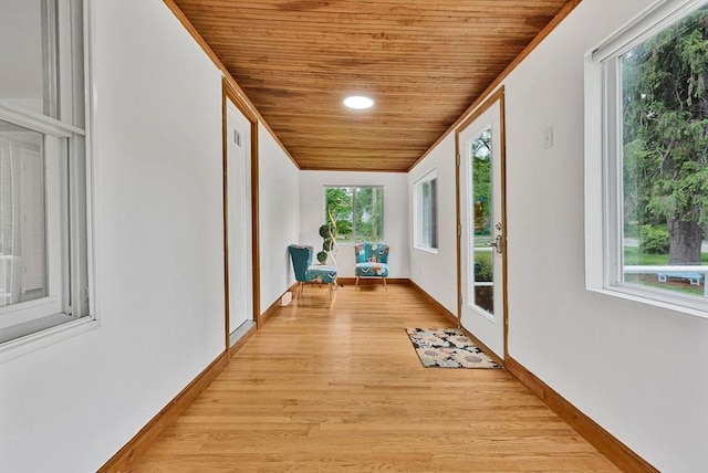 38 Main St, Acton, MA 01720 - hall featuring wood ceiling, light wood-style floors, and baseboards
