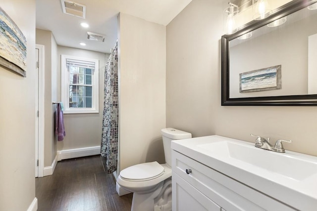 bathroom with visible vents, recessed lighting, toilet, and hardwood / wood-style flooring