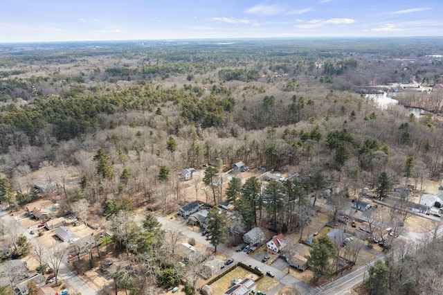 aerial view with a wooded view