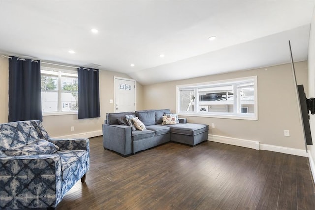 living area featuring vaulted ceiling, recessed lighting, wood finished floors, and baseboards