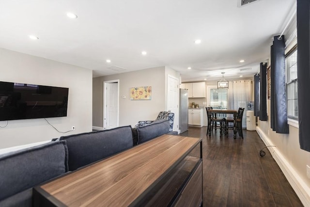 dining area featuring visible vents, recessed lighting, dark wood-style flooring, and baseboards