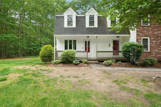 2 Colonial Dr Unit 2, Norton, MA 02766 - view of front of home with roof with shingles and a porch