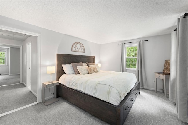 2 Colonial Dr Unit 2, Norton, MA 02766 - bedroom with light carpet, attic access, and a textured ceiling