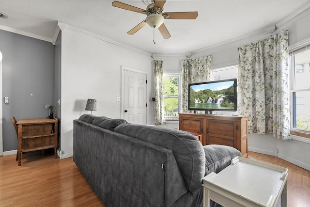 619 Crescent St, Brockton, MA 02302 - living room with crown molding, wood finished floors, and ceiling fan