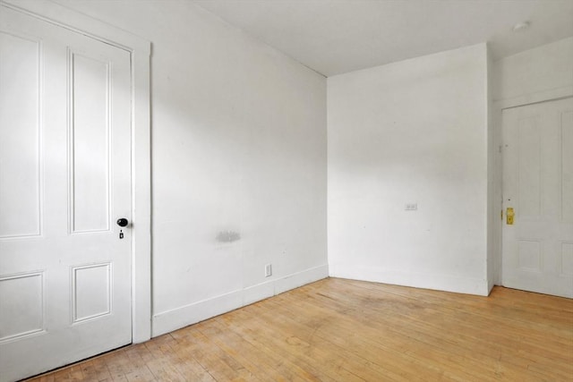 619 Crescent St, Brockton, MA 02302 - empty room featuring light wood-style flooring and a smoke detector