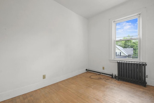 619 Crescent St, Brockton, MA 02302 - unfurnished room with radiator and hardwood / wood-style floors