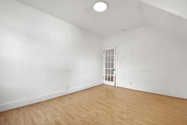 619 Crescent St, Brockton, MA 02302 - spare room with wood finished floors and lofted ceiling