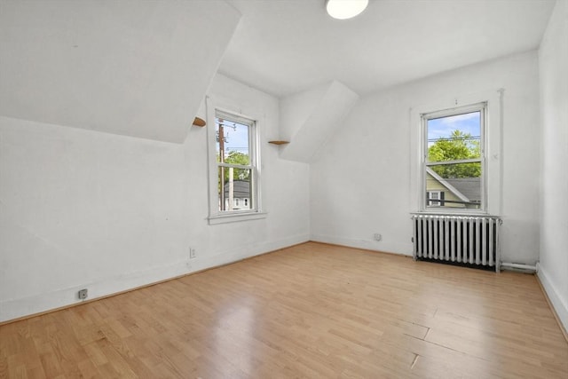 619 Crescent St, Brockton, MA 02302 - bonus room with radiator, wood finished floors, and vaulted ceiling