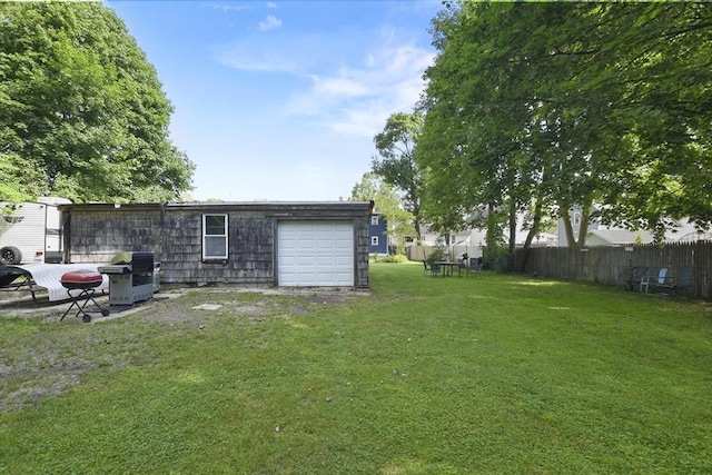 619 Crescent St, Brockton, MA 02302 - view of yard featuring a garage