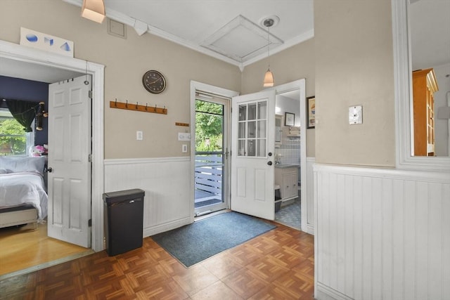 619 Crescent St, Brockton, MA 02302 - foyer with a wainscoted wall and crown molding